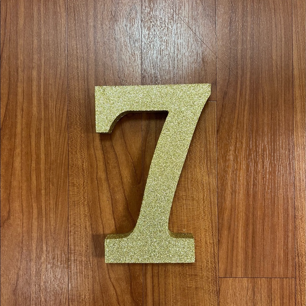 Gold glitter “7”